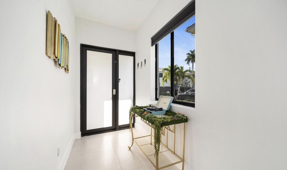 3254 Southwest 44th Street Fort Lauderdale, FL 33312 - Photo 13 of 26 a dining room with furniture and a window