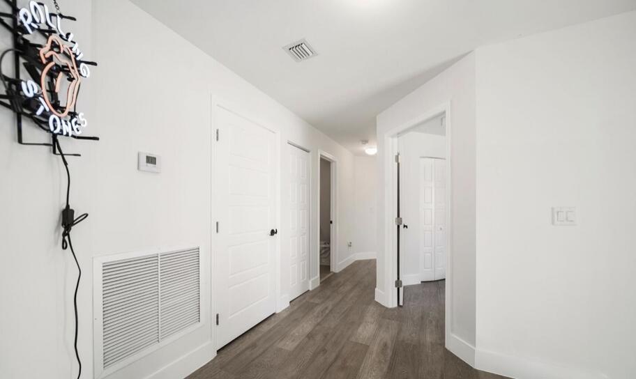 3254 Southwest 44th Street Fort Lauderdale, FL 33312 - Photo 23 of 26 a view of hallway with wooden floor