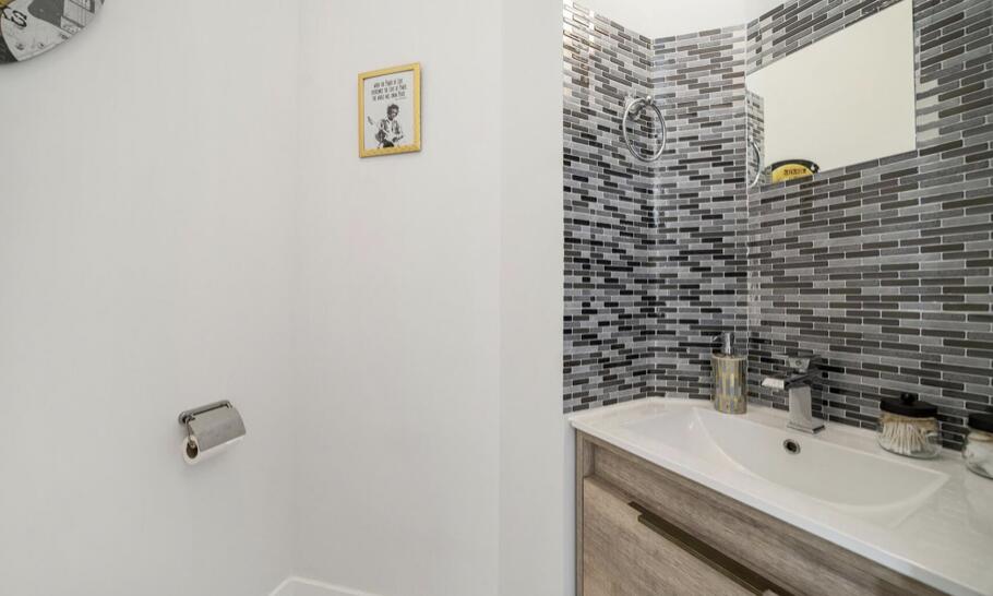 3254 Southwest 44th Street Fort Lauderdale, FL 33312 - Photo 25 of 26 a bathroom with a sink and a bathtub