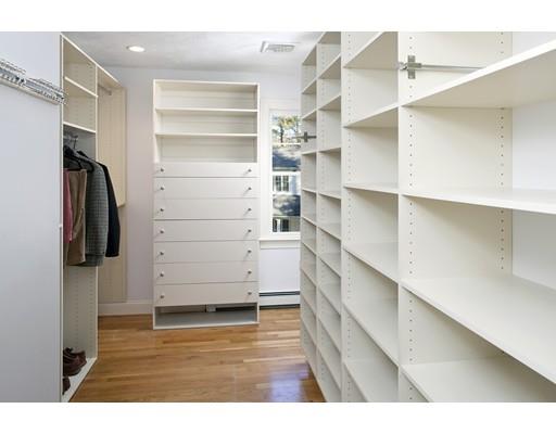 71 Bates Way Hanover, MA 02339 - Photo 13 of 30 a view of walk in closet with clothes and shoes