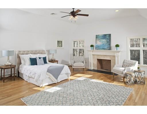 71 Bates Way Hanover, MA 02339 - Photo 14 of 30 a living room with furniture and a fireplace