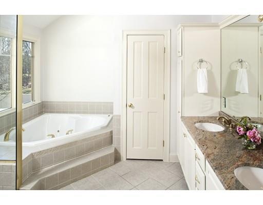 71 Bates Way Hanover, MA 02339 - Photo 15 of 30 a spacious bathroom with a granite countertop tub sink and mirror