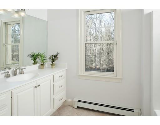 71 Bates Way Hanover, MA 02339 - Photo 20 of 30 a bathroom with a sink and a mirror