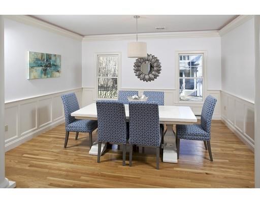 71 Bates Way Hanover, MA 02339 - Photo 7 of 30 a view of a dining room with furniture a rug and wooden floor