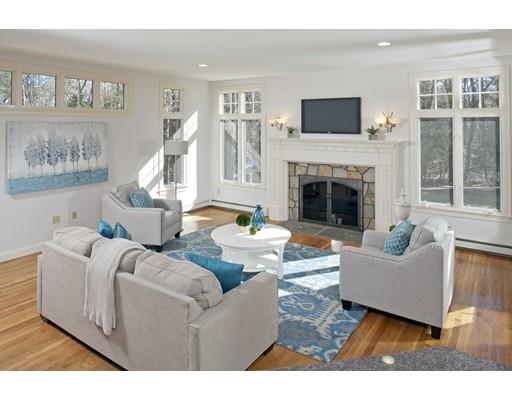 71 Bates Way Hanover, MA 02339 - Photo 9 of 30 a living room with furniture and a fireplace