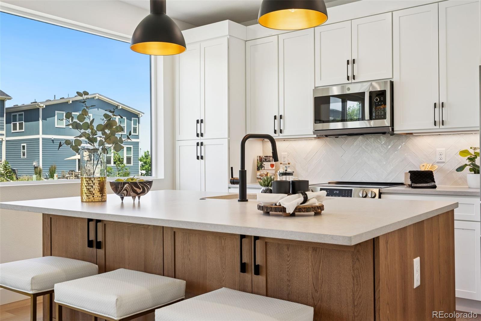 113 Mohawk Circle Superior, CO 80027 - Photo 13 of 50 a kitchen with a sink cabinets and appliances