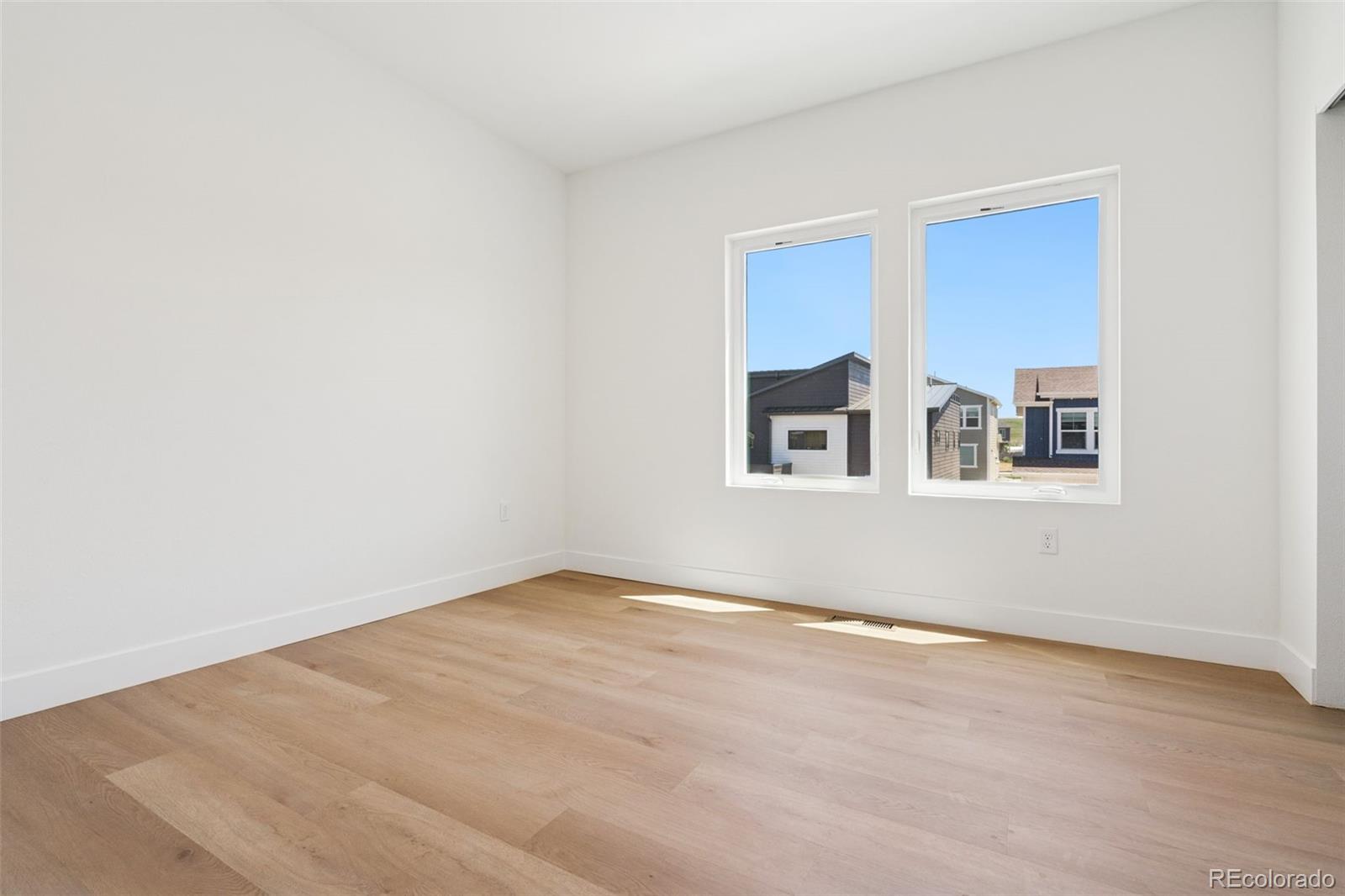 113 Mohawk Circle Superior, CO 80027 - Photo 21 of 50 a view of an empty room with windows