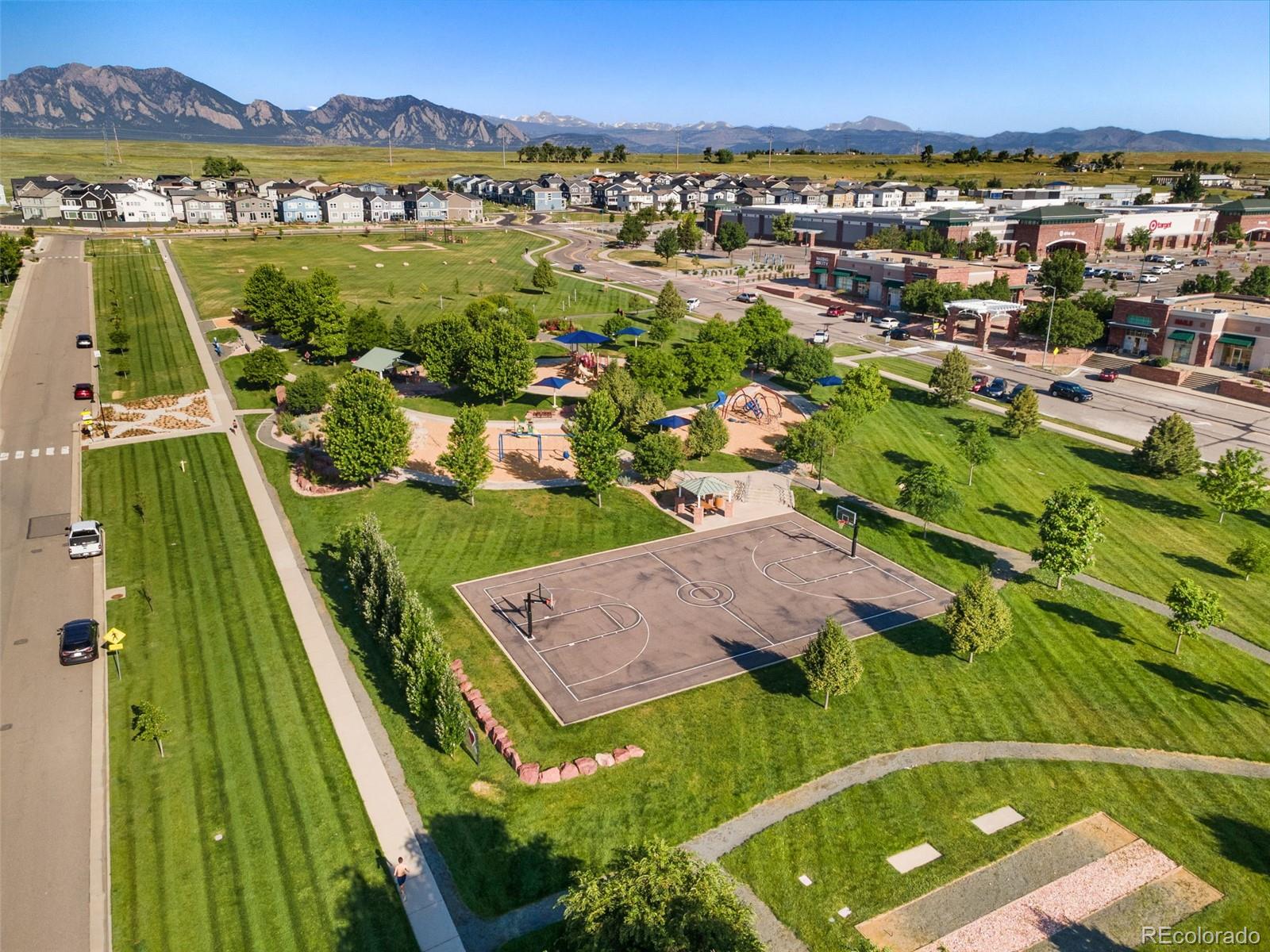 113 Mohawk Circle Superior, CO 80027 - Photo 40 of 50 an aerial view of residential houses with outdoor space and a lake view