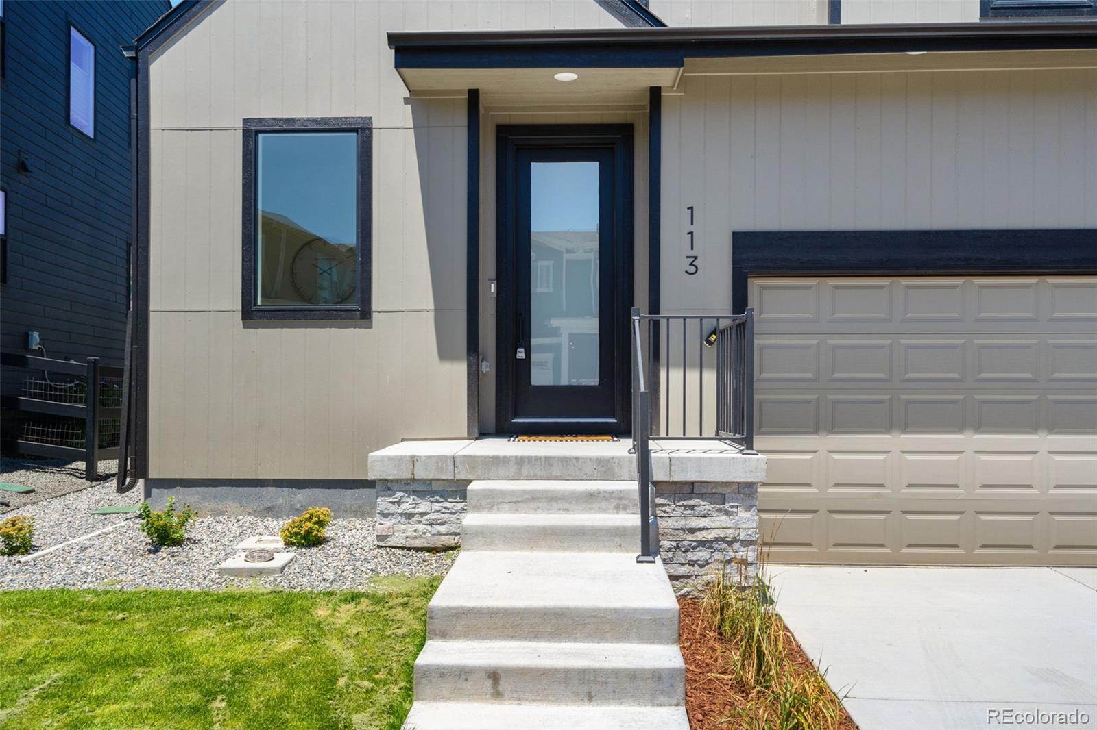 113 Mohawk Circle Superior, CO 80027 - Photo 4 of 50 a front view of a house with entryway