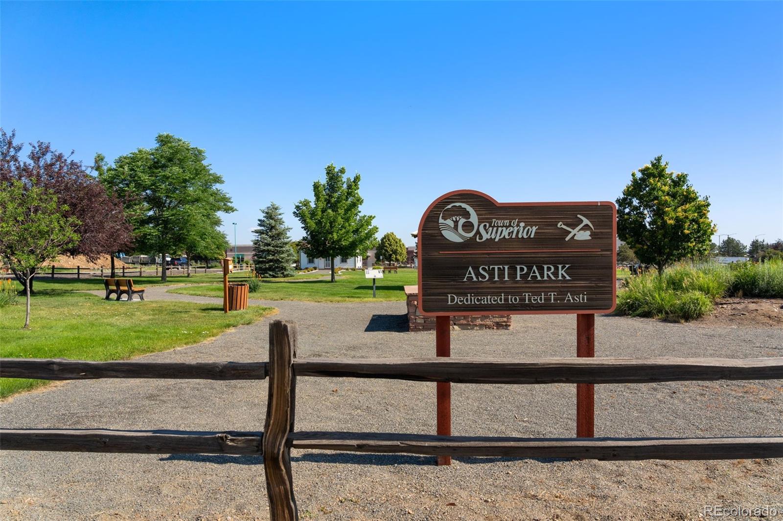 113 Mohawk Circle Superior, CO 80027 - Photo 42 of 50 a view of a street with benches in the background