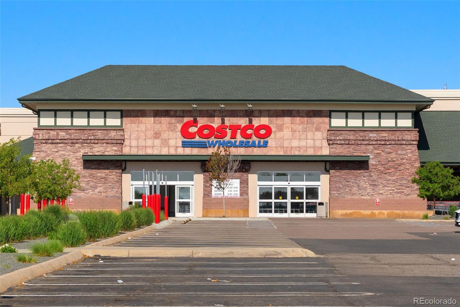 113 Mohawk Circle Superior, CO 80027 - Photo 45 of 50 a front view of a house with a yard and a garage