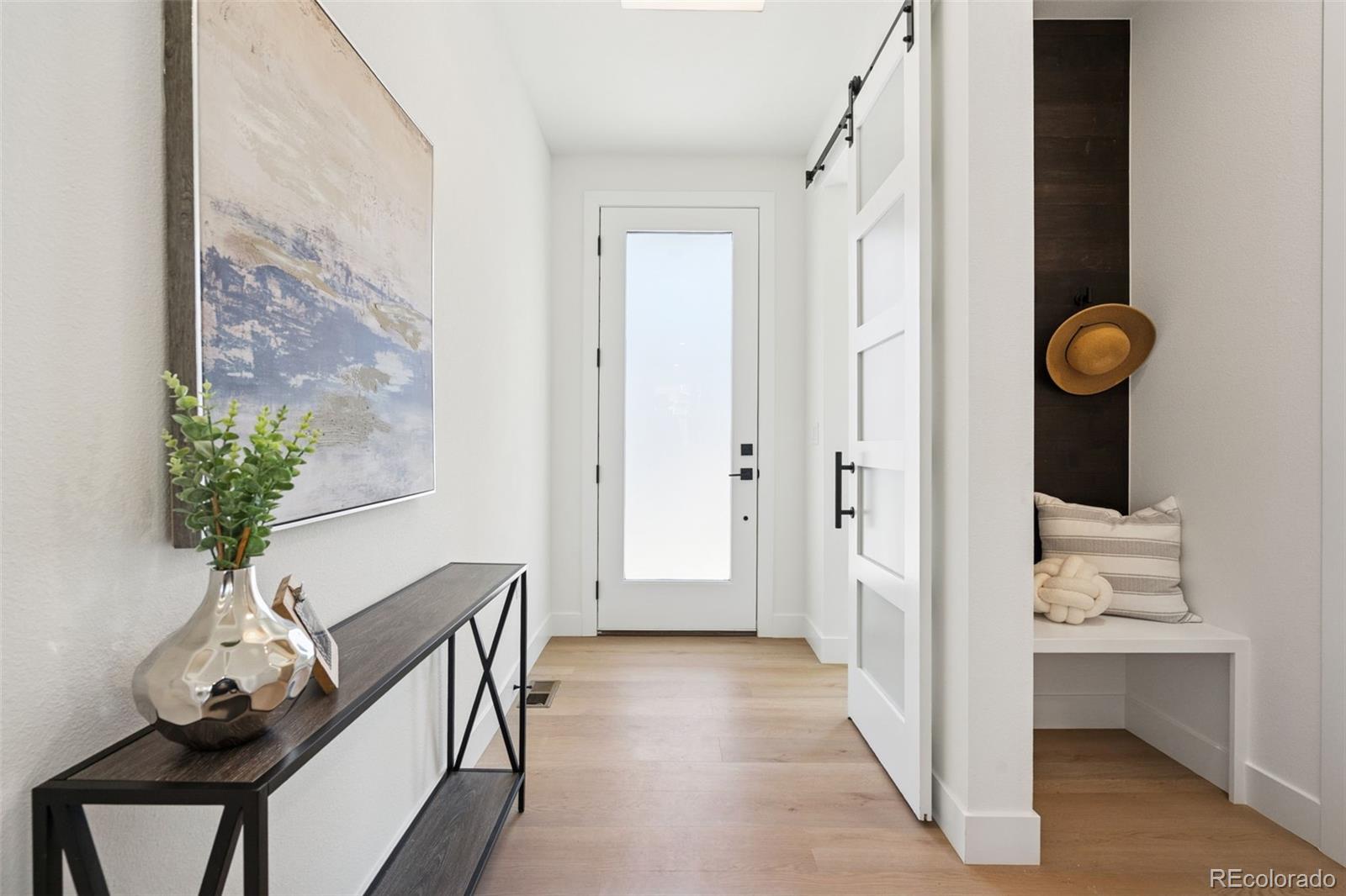 113 Mohawk Circle Superior, CO 80027 - Photo 5 of 50 a view of room with furniture and wooden floor