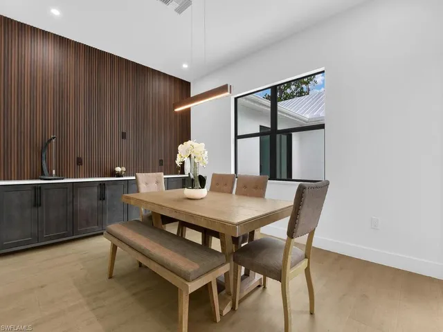 a view of a dining room with furniture