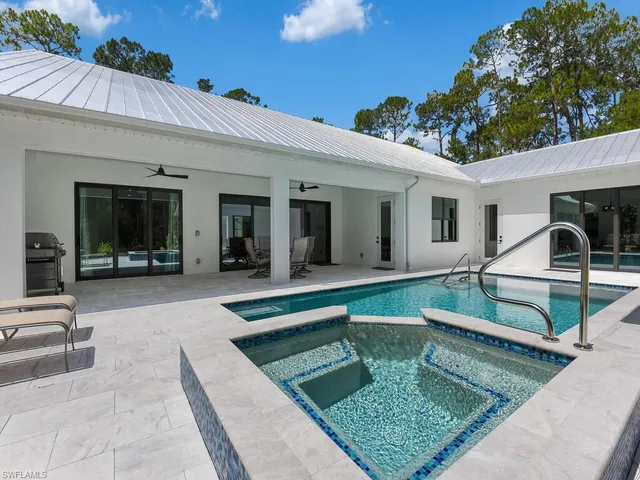 a view of a house with lounge chair