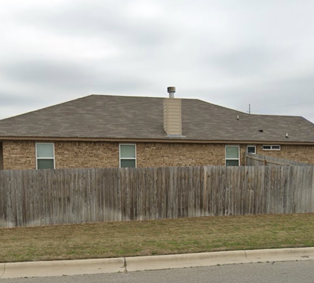 703 Ridgeview Drive Temple, TX 76502 - Photo 4 of 5 a backyard of a house