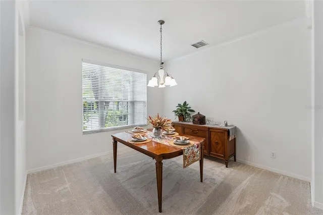a spacious bedroom with a bed and window