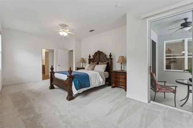 a bathroom with a sink a mirror and a shower