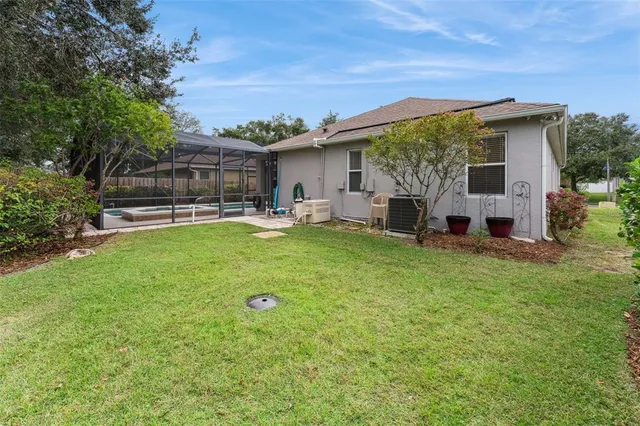 a kitchen with stainless steel appliances granite countertop a stove refrigerator sink and cabinets