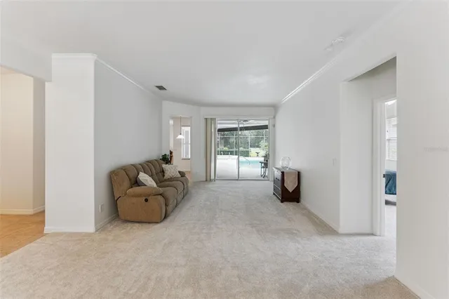 a bed room with a bed and a chandelier