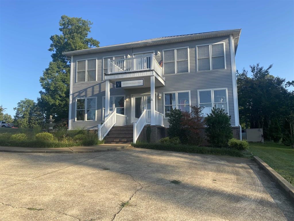 55 Old South Road Counce, TN 38326 - Photo 1 of 24 a front view of a house with a yard