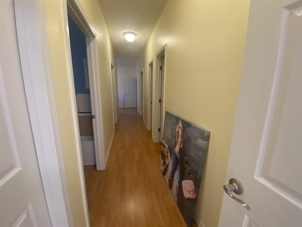 55 Old South Road Counce, TN 38326 - Photo 18 of 24 a view of a hallway with wooden floor