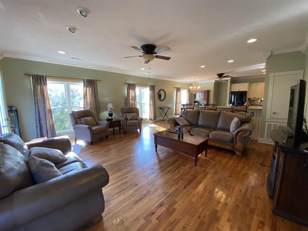 55 Old South Road Counce, TN 38326 - Photo 20 of 24 a living room with furniture and a flat screen tv