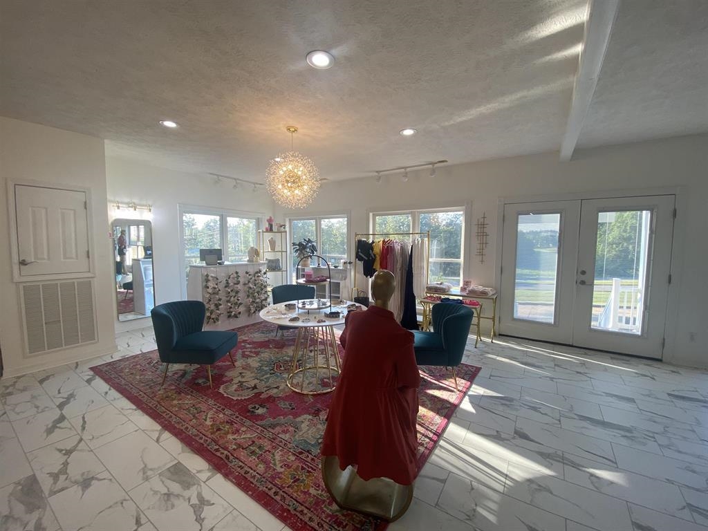 55 Old South Road Counce, TN 38326 - Photo 5 of 24 a living room with furniture large window and wooden floor
