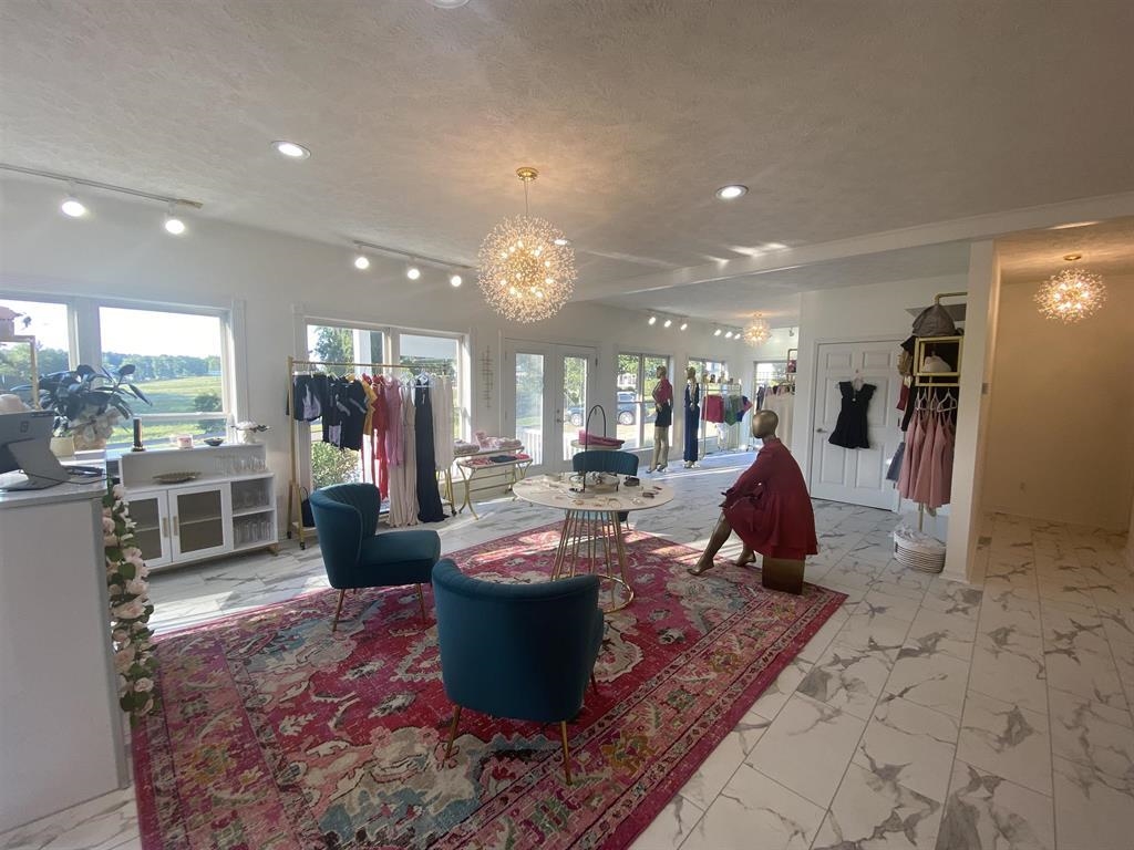 55 Old South Road Counce, TN 38326 - Photo 6 of 24 a view of a lobby with a couch and dining table