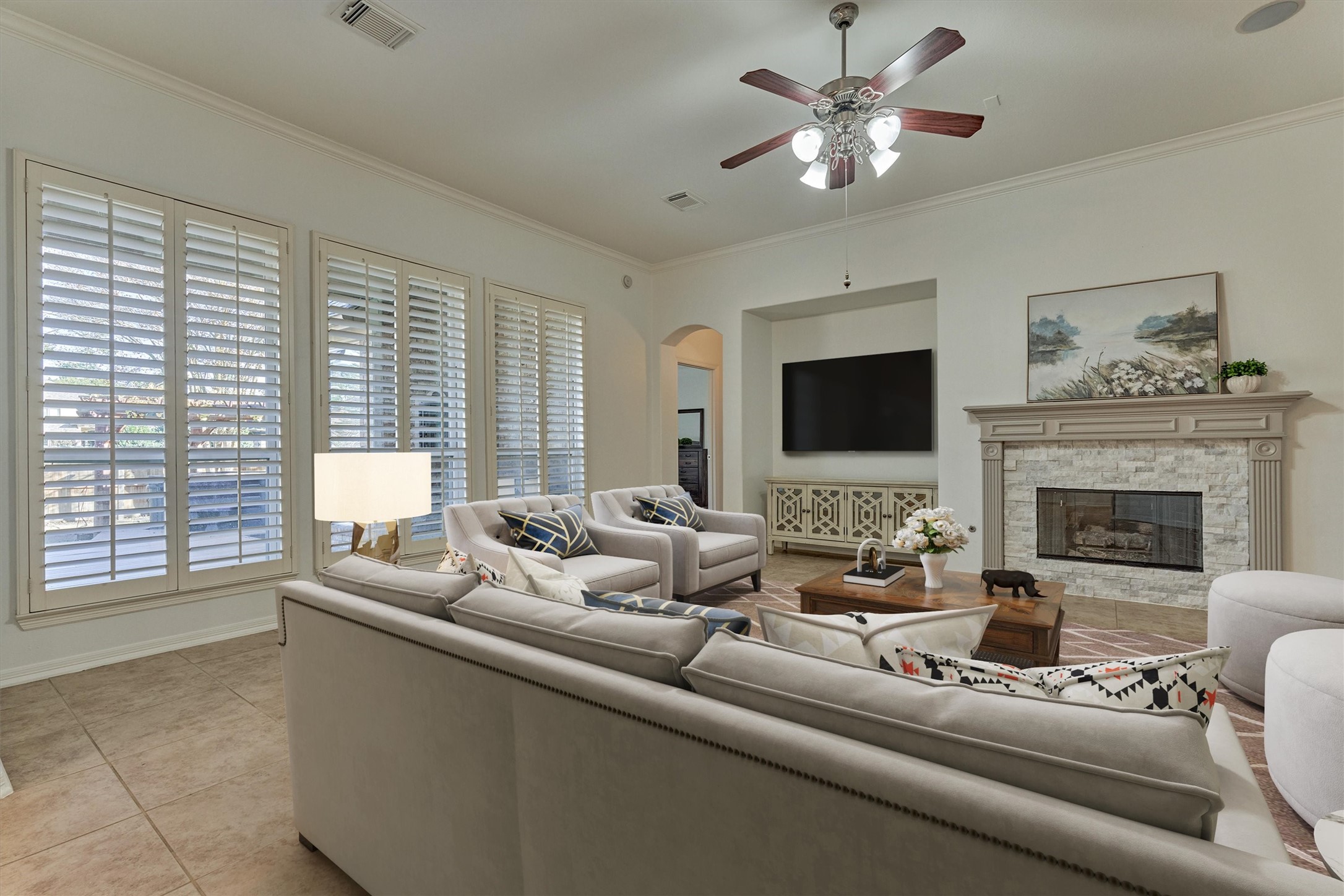 94 Oriel Oaks Circle The Woodlands, TX 77382 - Photo 23 of 46 a living room with furniture and a flat screen tv