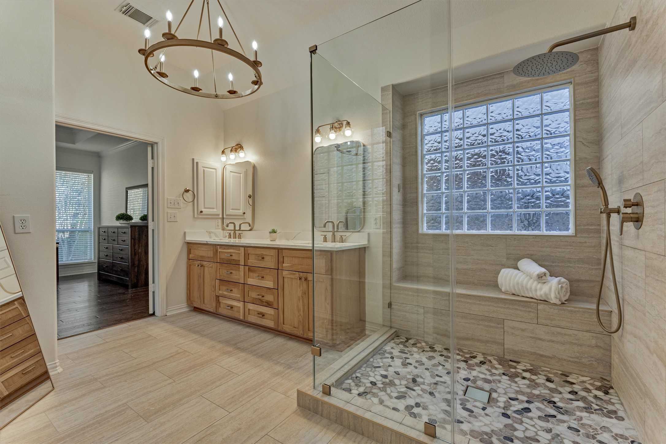 94 Oriel Oaks Circle The Woodlands, TX 77382 - Photo 31 of 46 a bathroom with a sink a toilet and a shower