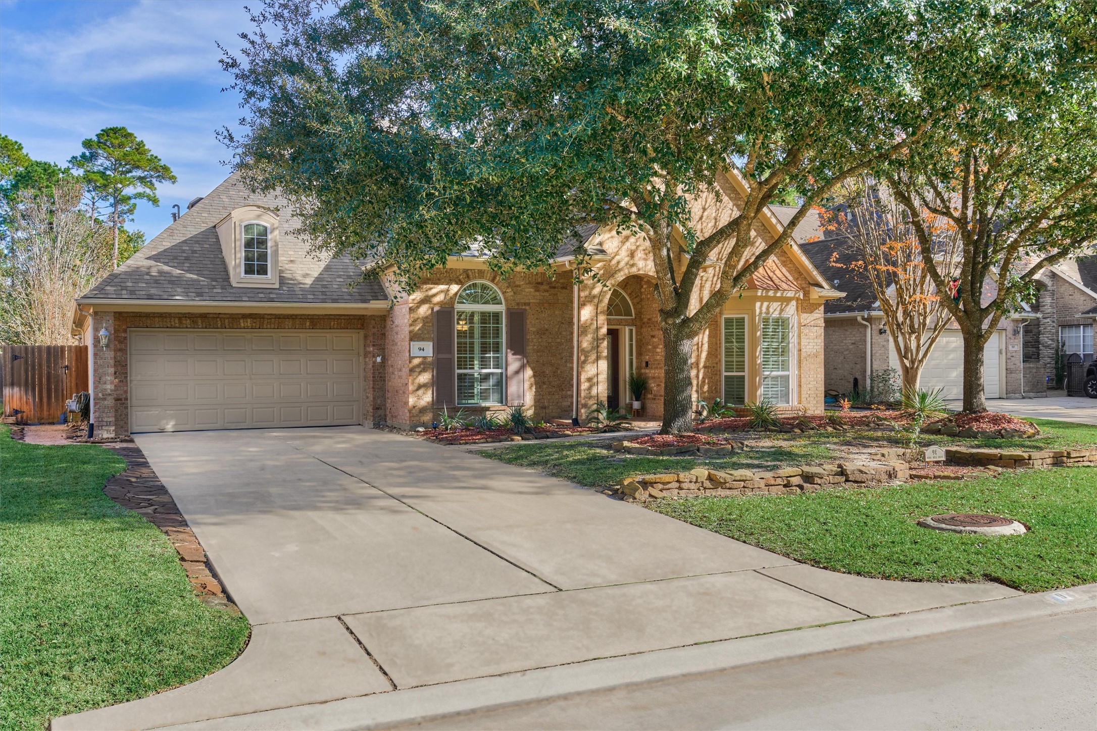94 Oriel Oaks Circle The Woodlands, TX 77382 - Photo 44 of 46 front view of a house with a yard