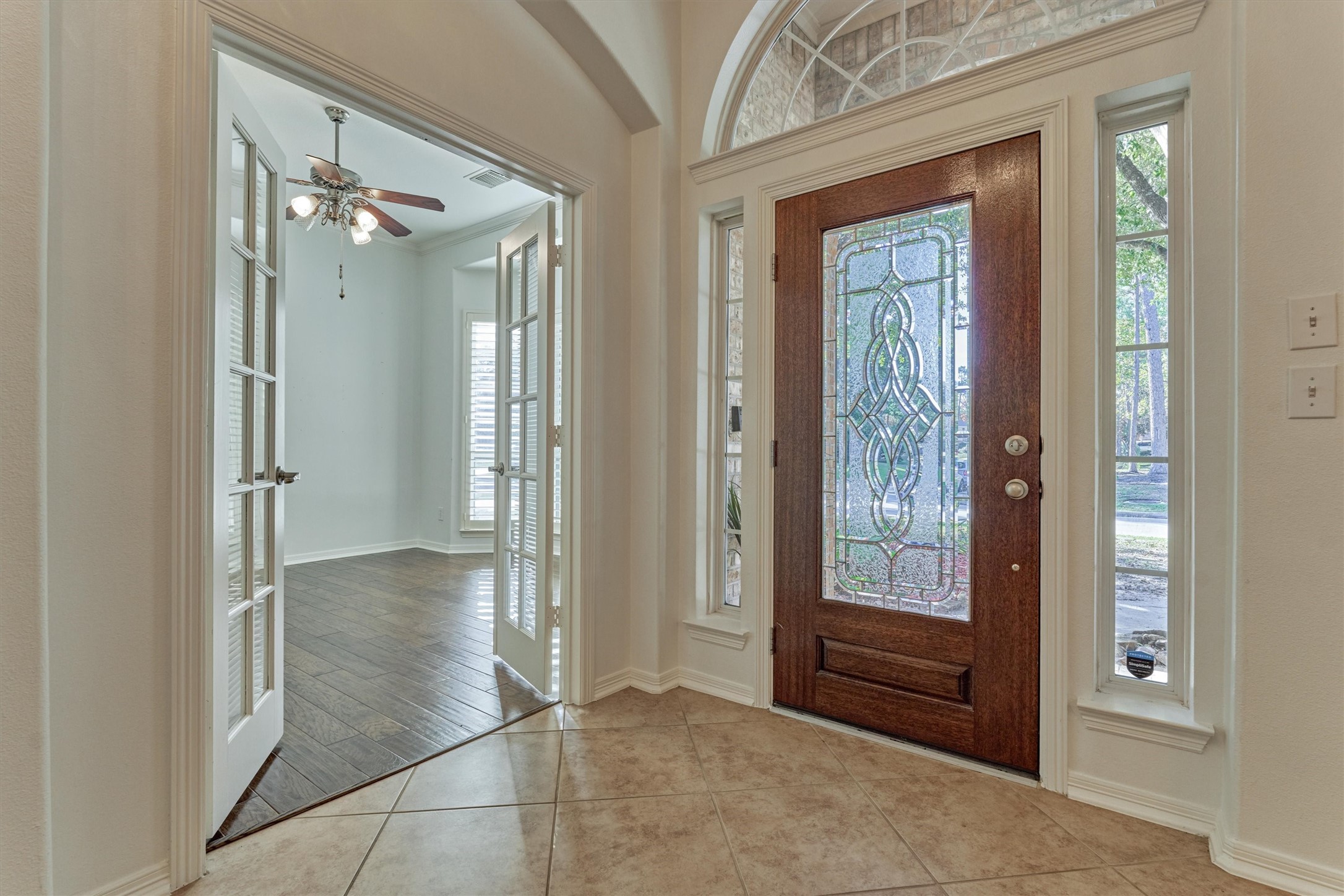 94 Oriel Oaks Circle The Woodlands, TX 77382 - Photo 7 of 46 an empty room with front door