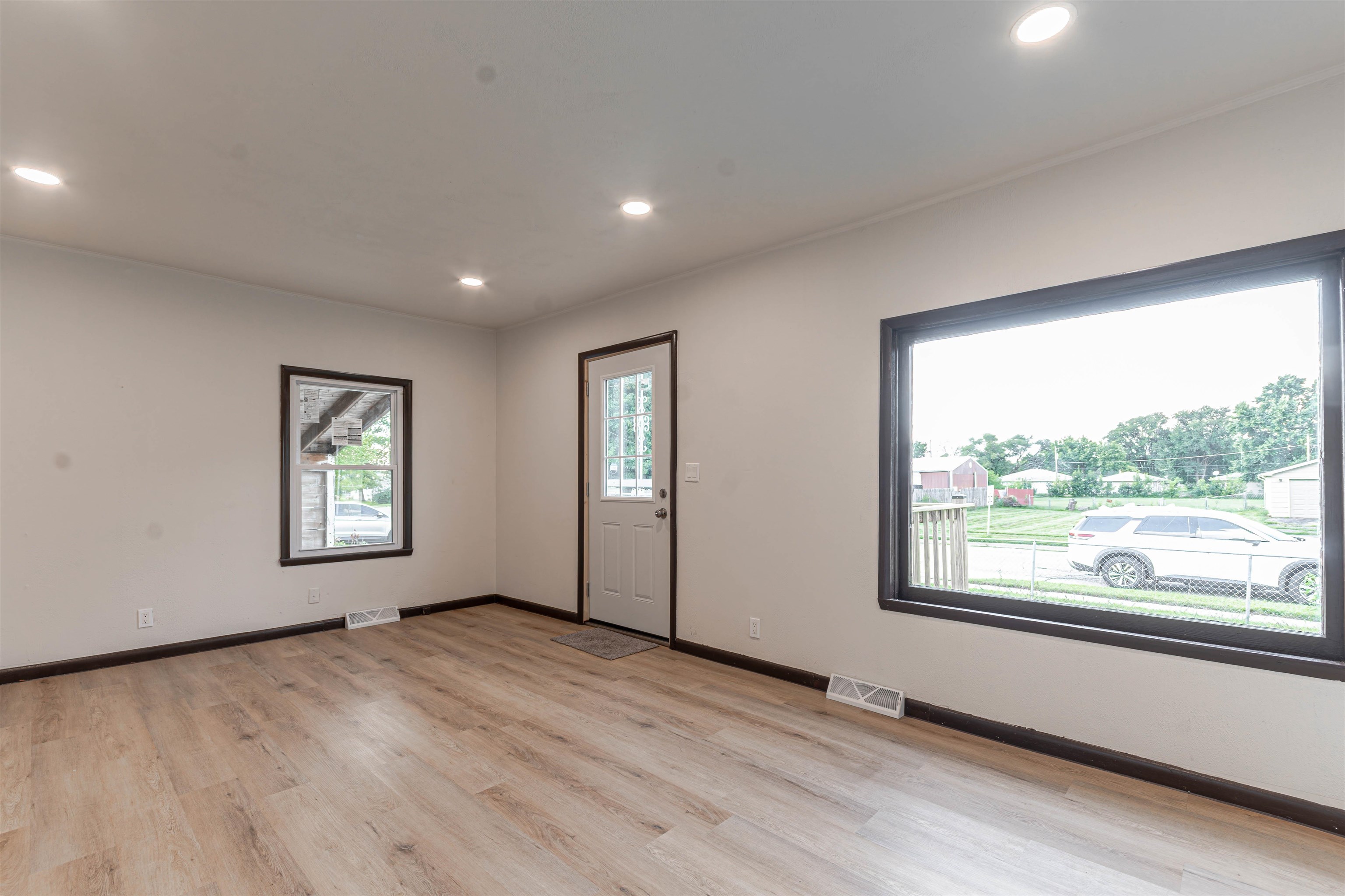 3412 Gilbert Avenue Rockford, IL 61101 - Photo 16 of 19 wooden floor in an empty room with a window