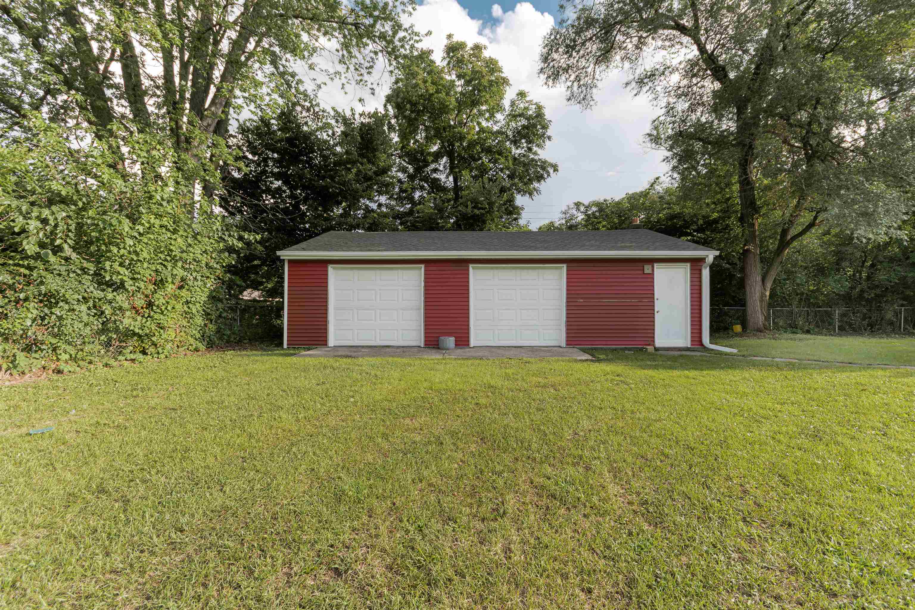 3412 Gilbert Avenue Rockford, IL 61101 - Photo 19 of 19 a front view of house with yard and trees