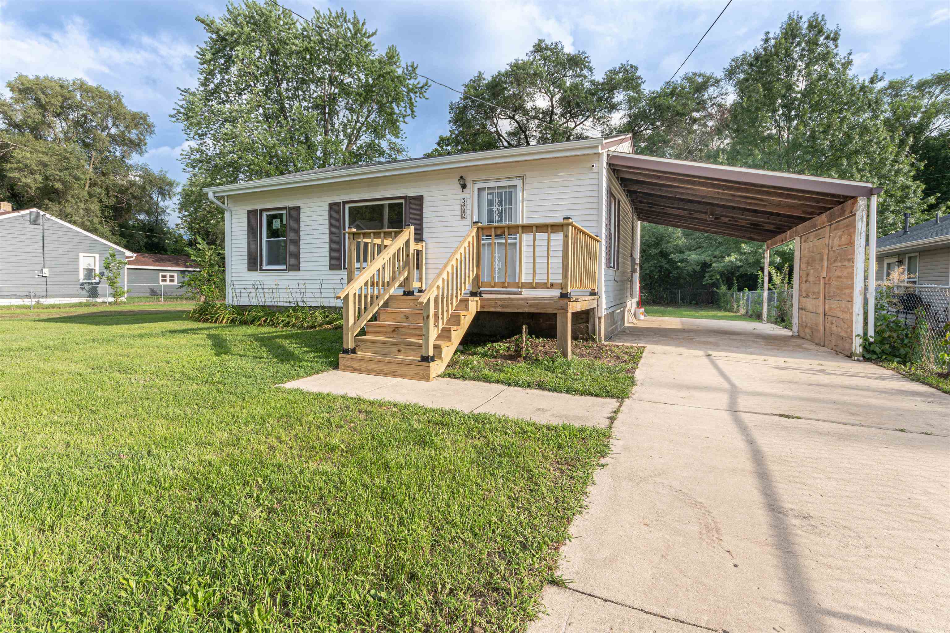 3412 Gilbert Avenue Rockford, IL 61101 - Photo 2 of 19 a view of a house with backyard porch and sitting area