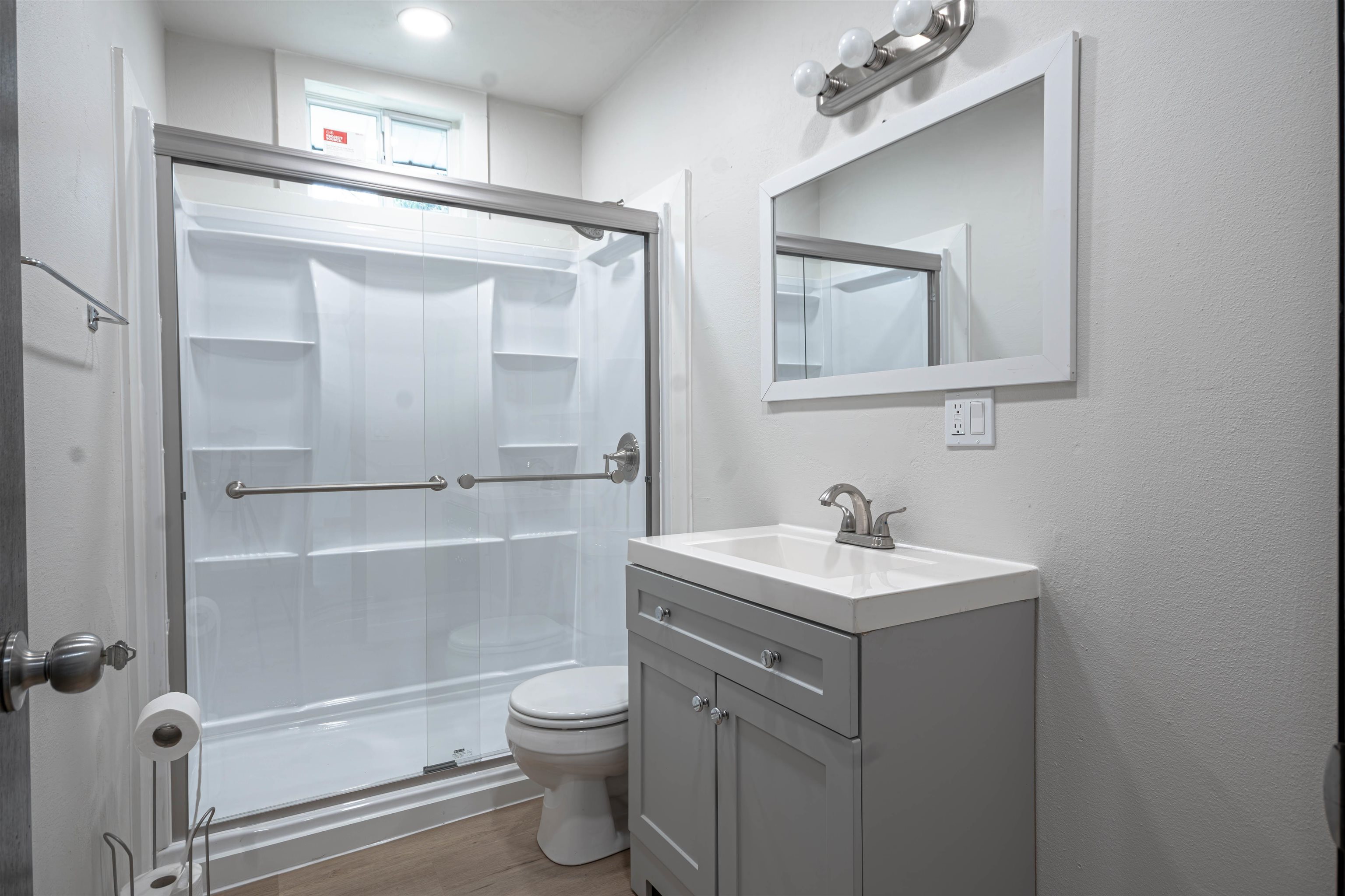 3412 Gilbert Avenue Rockford, IL 61101 - Photo 4 of 19 a bathroom with a sink a toilet and shower