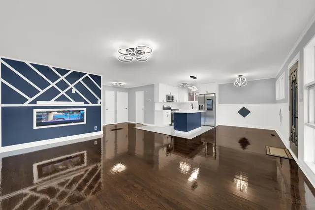 a view of a living room and dining room