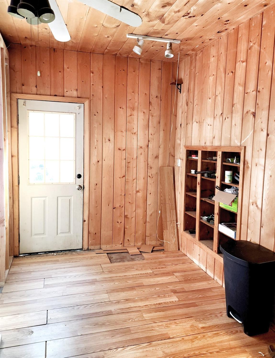 3221 Brauer Road Georgetown, CA 95634 - Photo 18 of 24 a view of a closet area with wooden floor