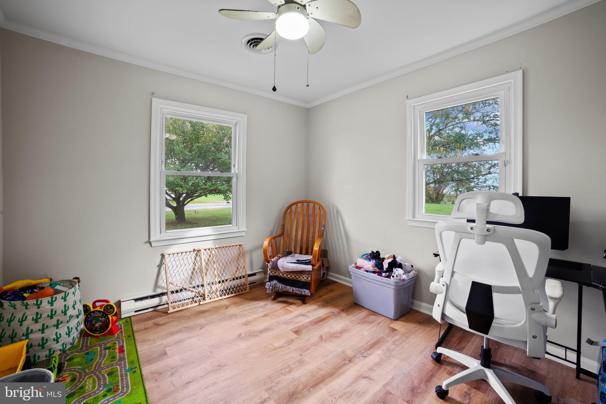 10444 Worton Road Worton, MD 21678 - Photo 14 of 25 a view of a workspace with furniture and a window