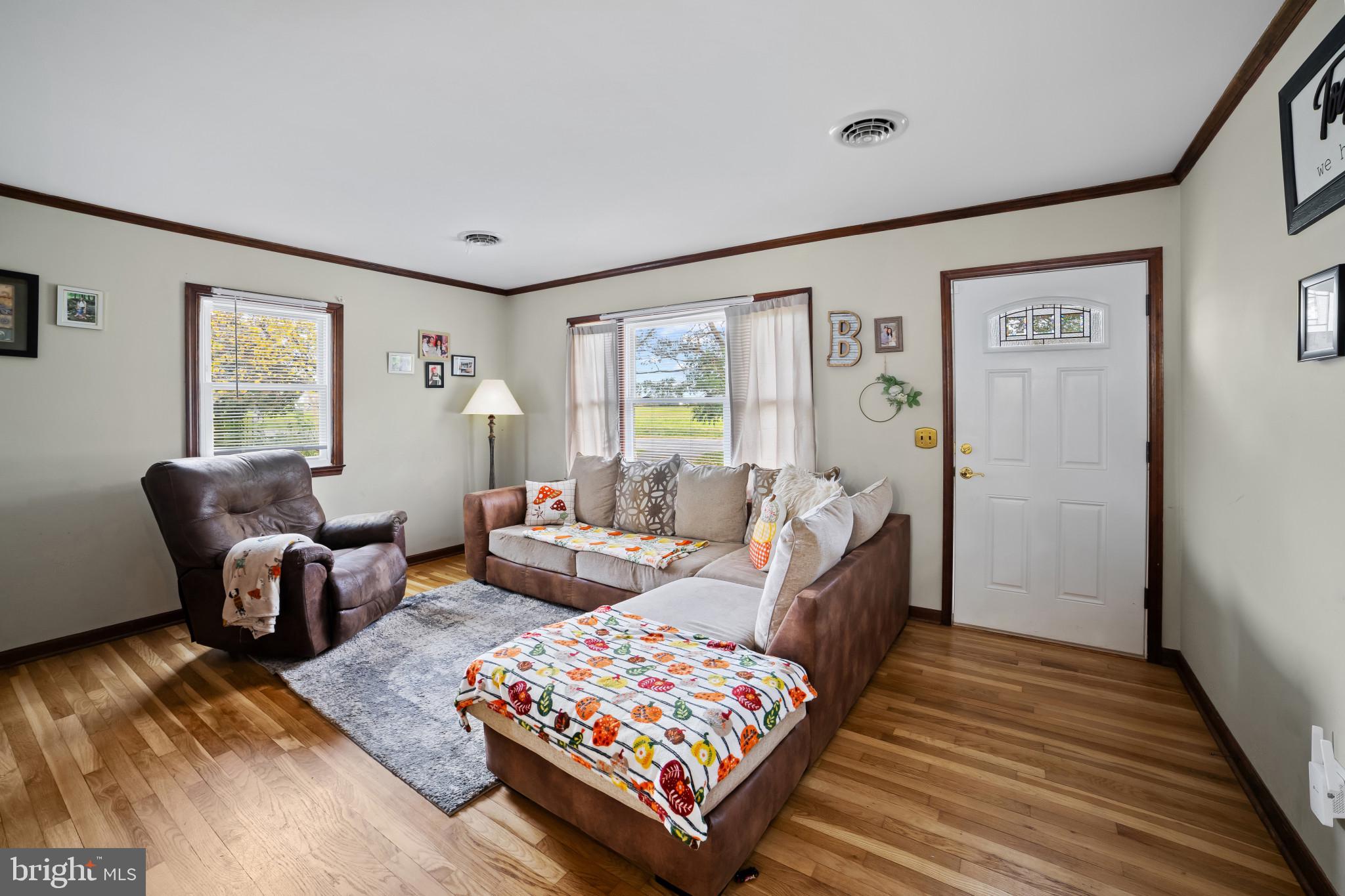 10444 Worton Road Worton, MD 21678 - Photo 2 of 25 a living room with furniture and a rug