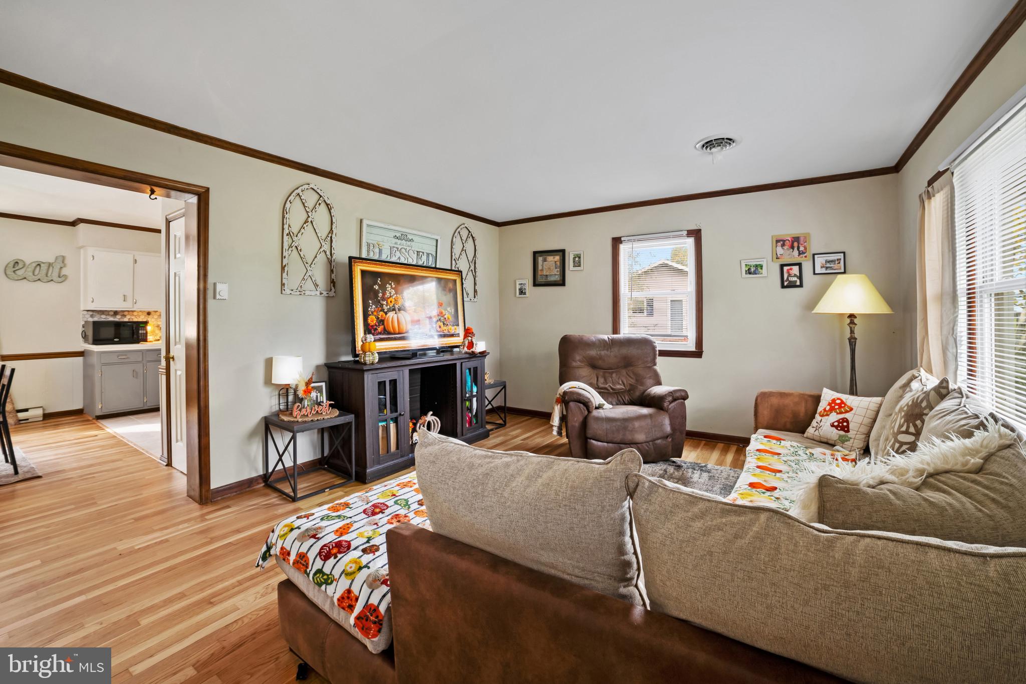 10444 Worton Road Worton, MD 21678 - Photo 4 of 25 a living room with furniture and wooden floor