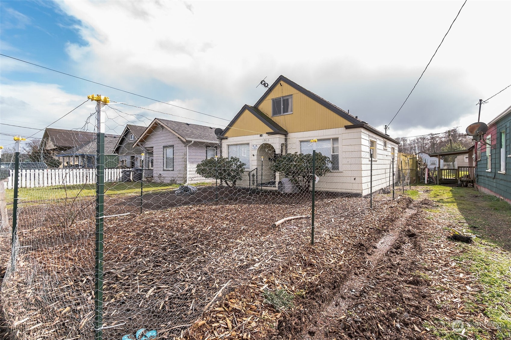 1913 Morgan Street Aberdeen, WA 98520 - Photo 2 of 26 a view of a house next to a yard