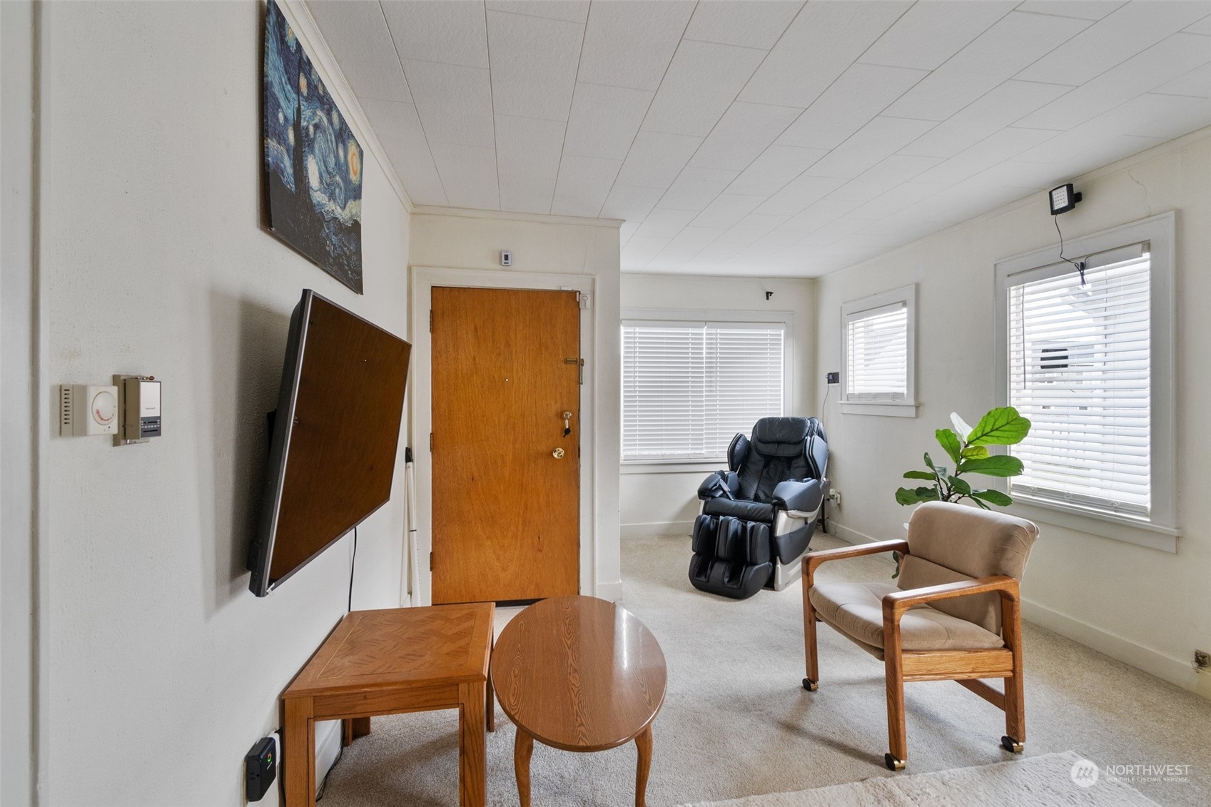 1913 Morgan Street Aberdeen, WA 98520 - Photo 6 of 26 a living room with furniture and a flat screen tv
