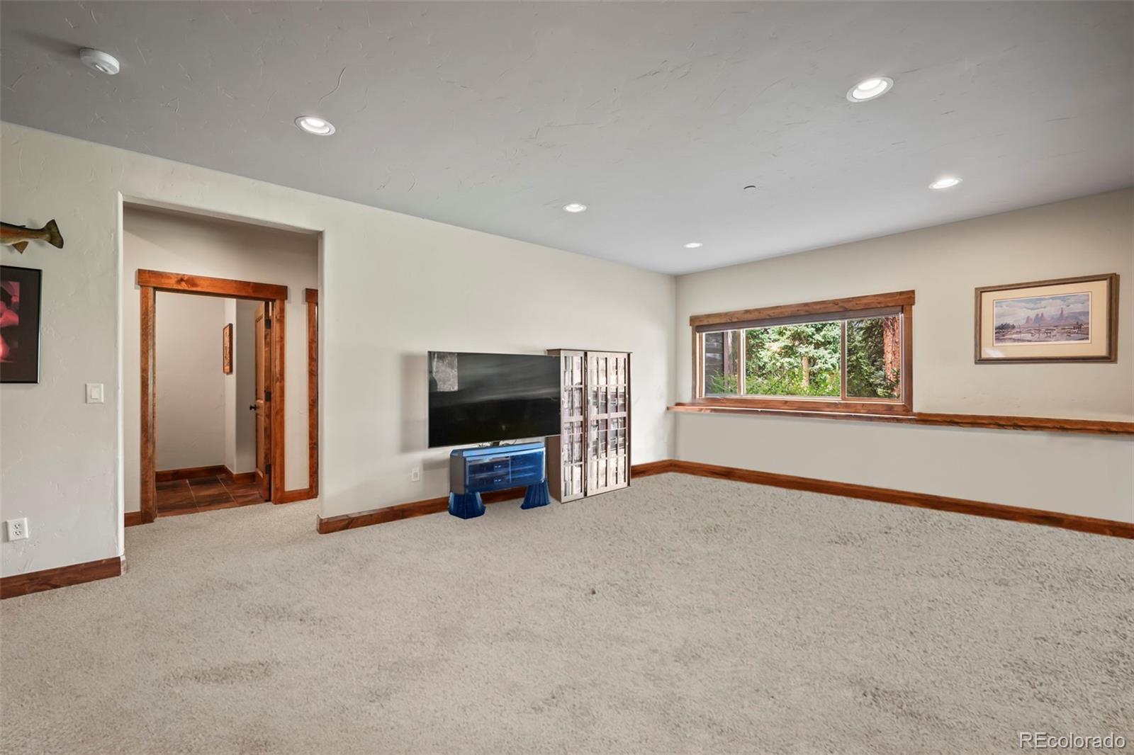 560 Two Cabins Drive Silverthorne, CO 80498 - Photo 23 of 49 a view of a livingroom with an empty space and a window