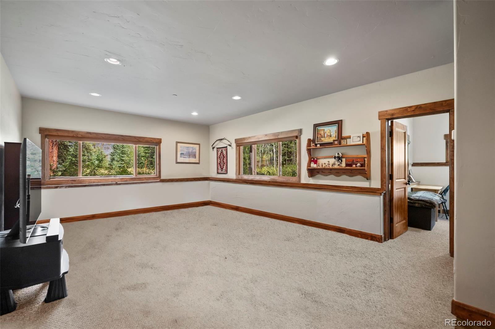 560 Two Cabins Drive Silverthorne, CO 80498 - Photo 24 of 49 a view of an empty room with a window