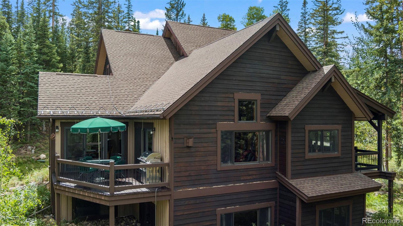 560 Two Cabins Drive Silverthorne, CO 80498 - Photo 34 of 49 a view of house and front view of a house