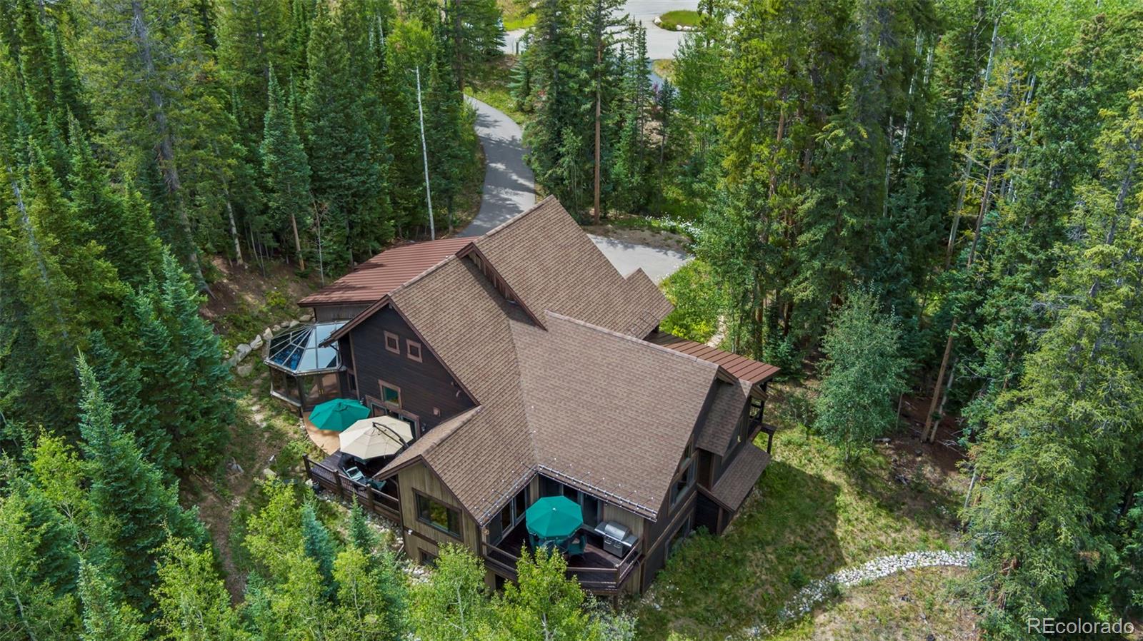 560 Two Cabins Drive Silverthorne, CO 80498 - Photo 37 of 49 an aerial view of a house with yard and outdoor seating