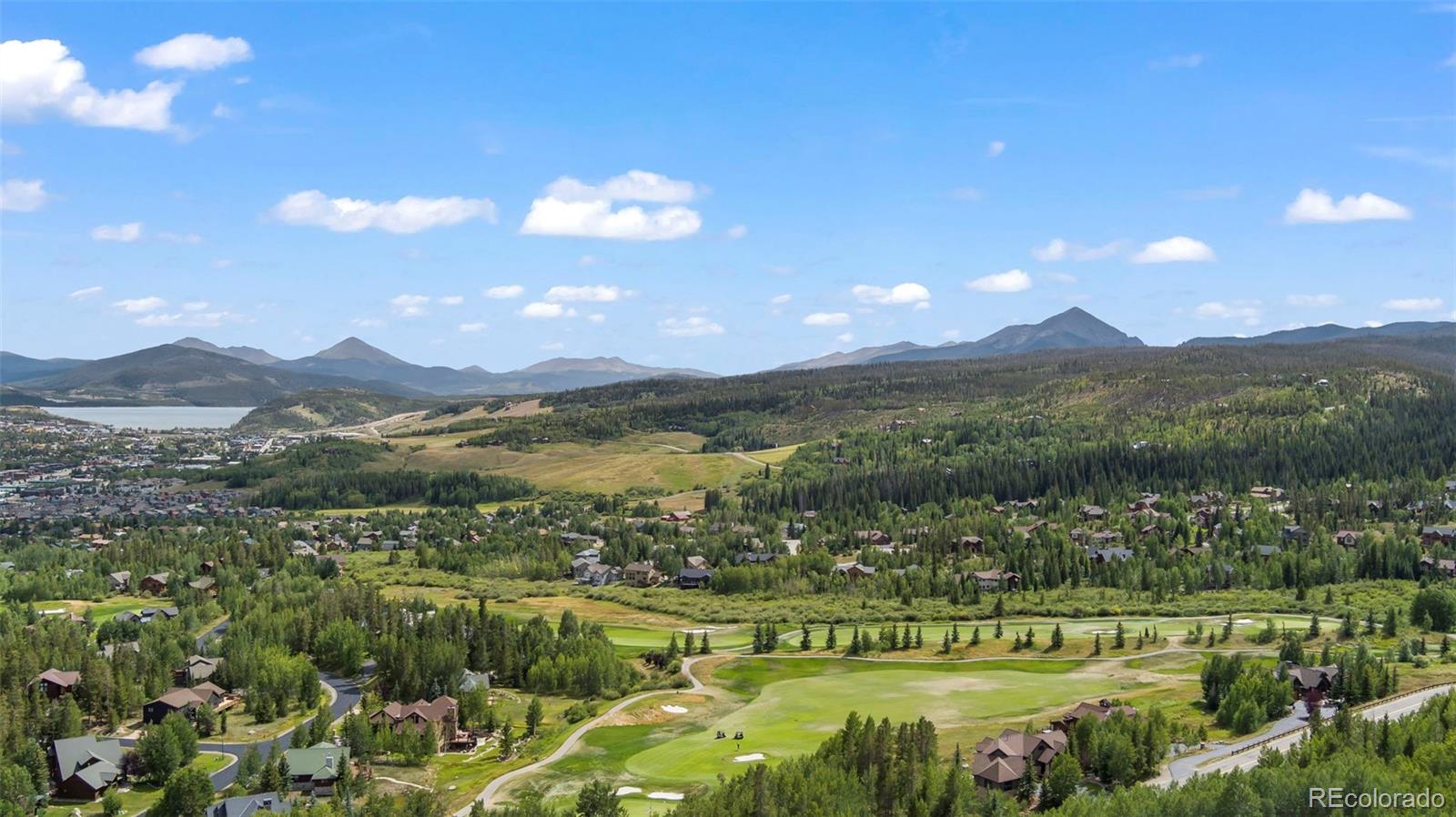 560 Two Cabins Drive Silverthorne, CO 80498 - Photo 41 of 49 a view of a city with mountains in the background