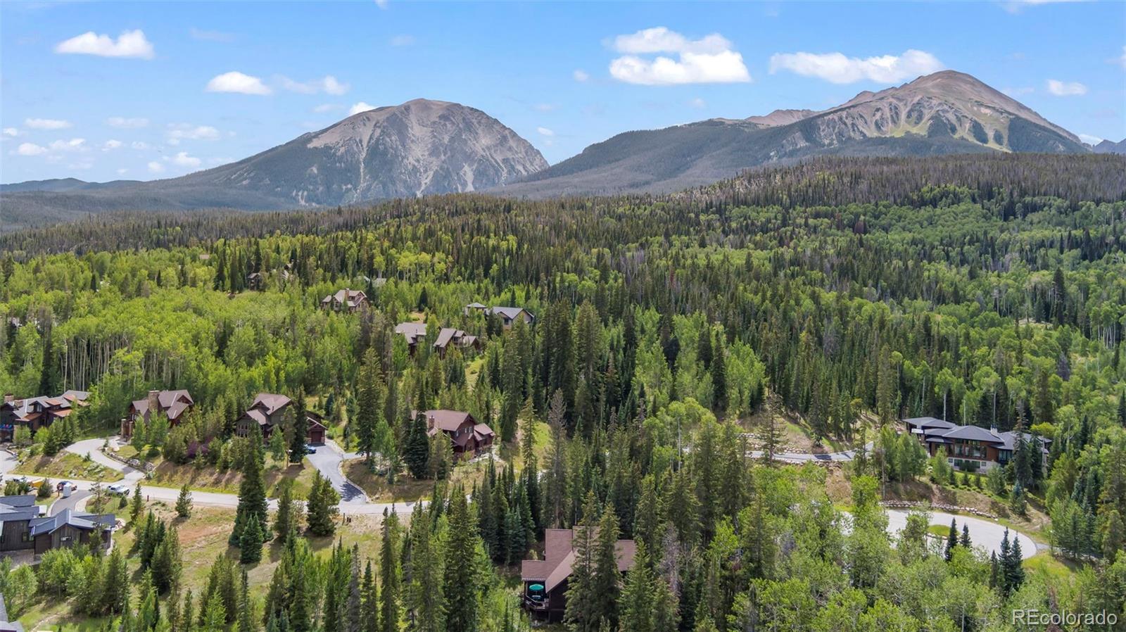 560 Two Cabins Drive Silverthorne, CO 80498 - Photo 49 of 49 a view of a lush green hillside and a mountain view