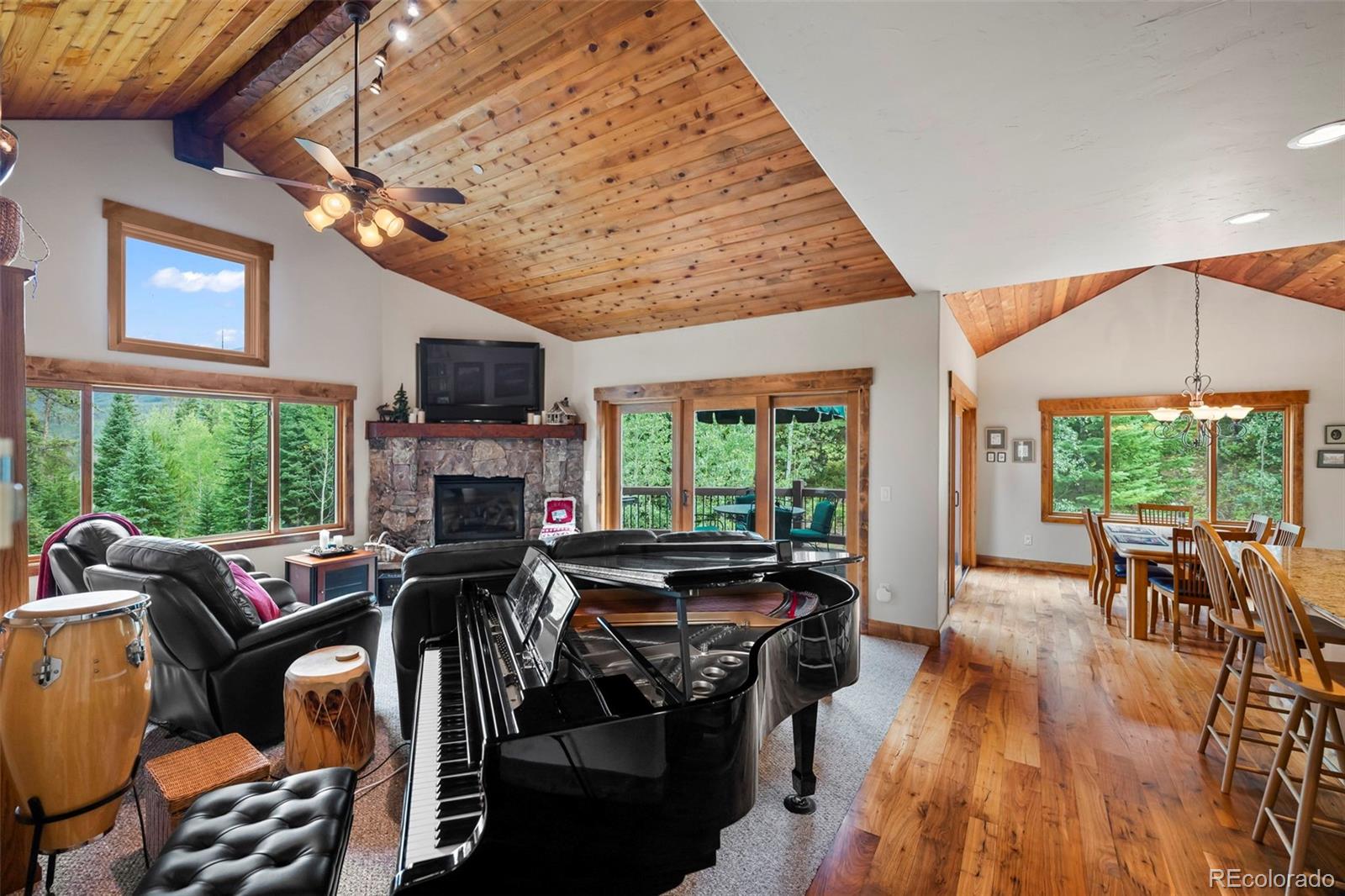 560 Two Cabins Drive Silverthorne, CO 80498 - Photo 10 of 49 a view of a dining room with furniture window and outside view